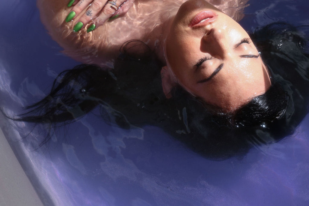 Model soaks in a relaxing Kush Queen CBD infused bath